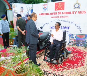 Mr Sudheendranath R hands over Mobility Aid